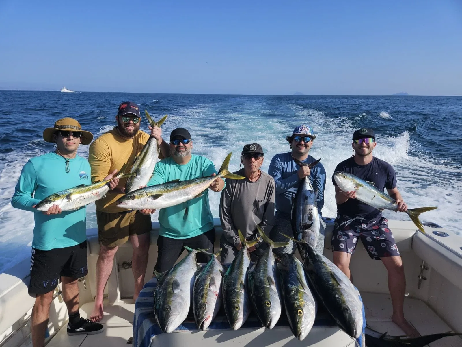 Crew with a full spread of yellowtail